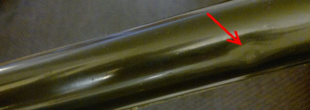 small dent in top tube
